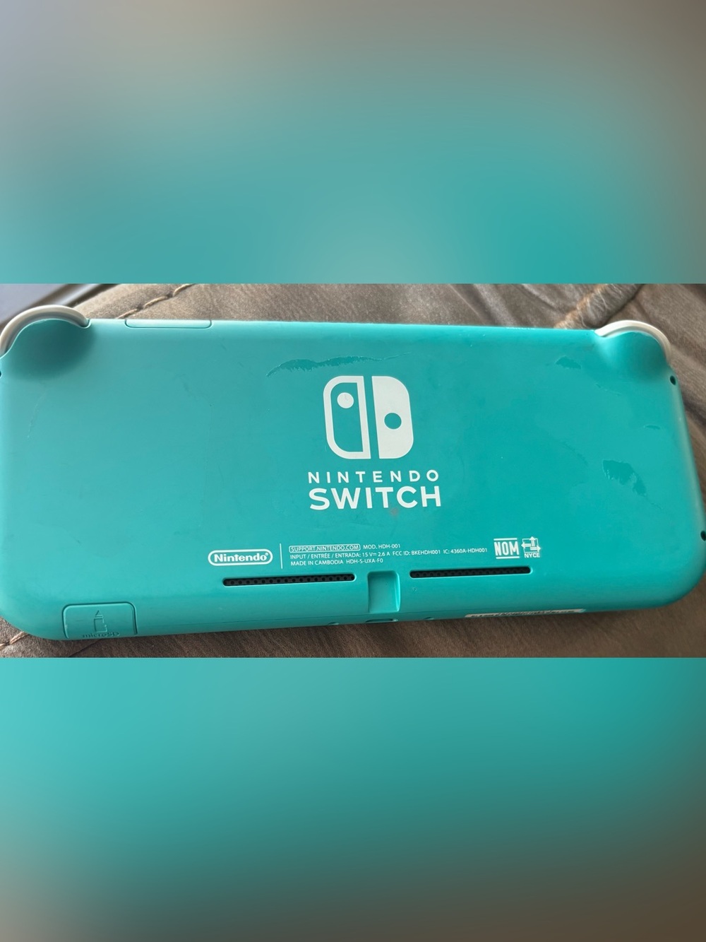 Nintendo Switch Lite Turquoise Back Logo Handheld Console